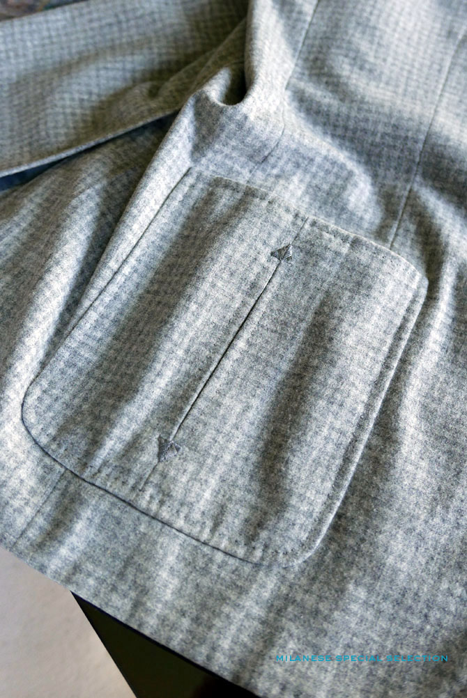 Veste sport à poches plaquées signée Claude Rousseau